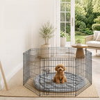 Puppy in the 8-panel playpen in a living room