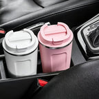 Travel mugs in car cup holders