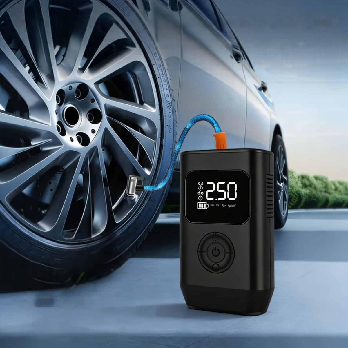 Tyre inflator connected to a car tyre