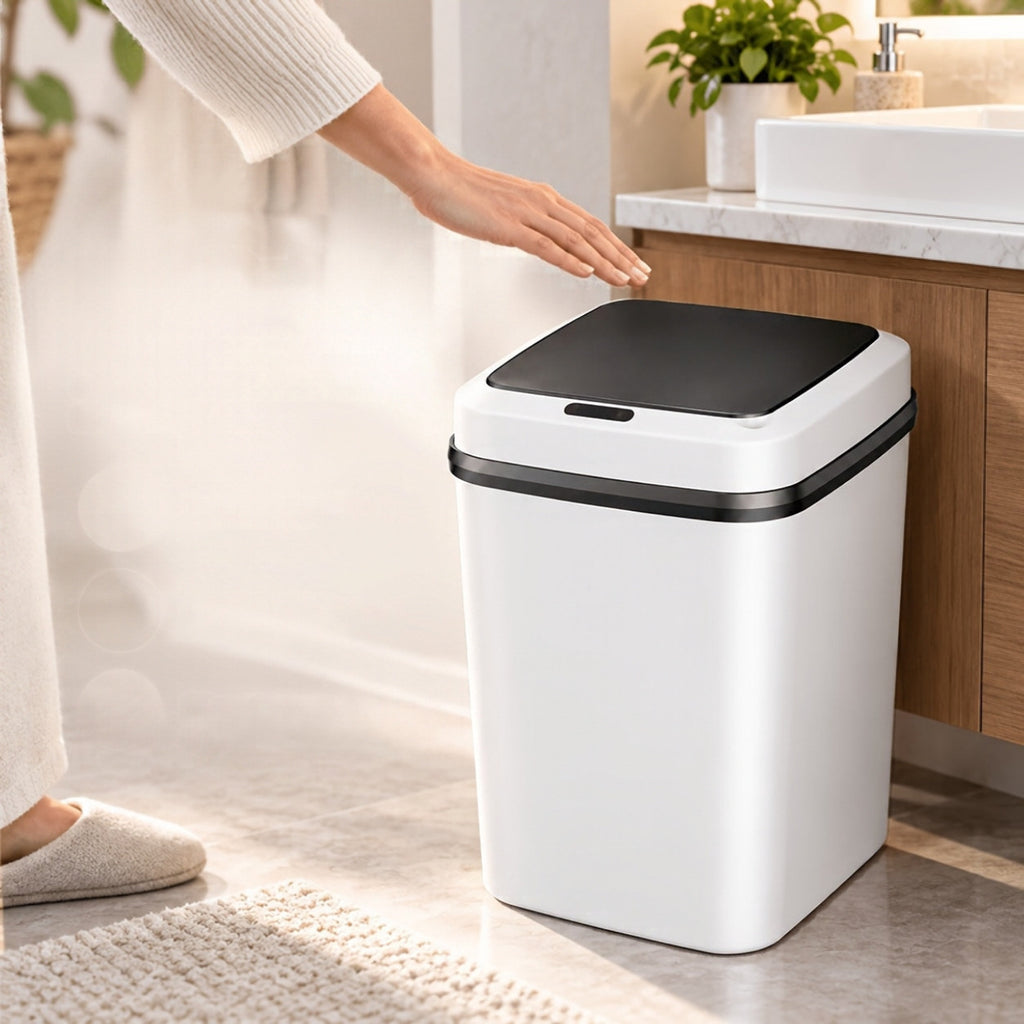 Hand-free sensor bin by a vanity
