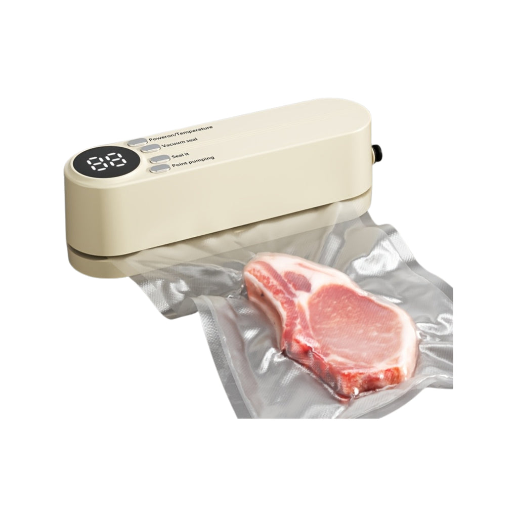 Compact USB vacuum sealer in beige sealing a steak